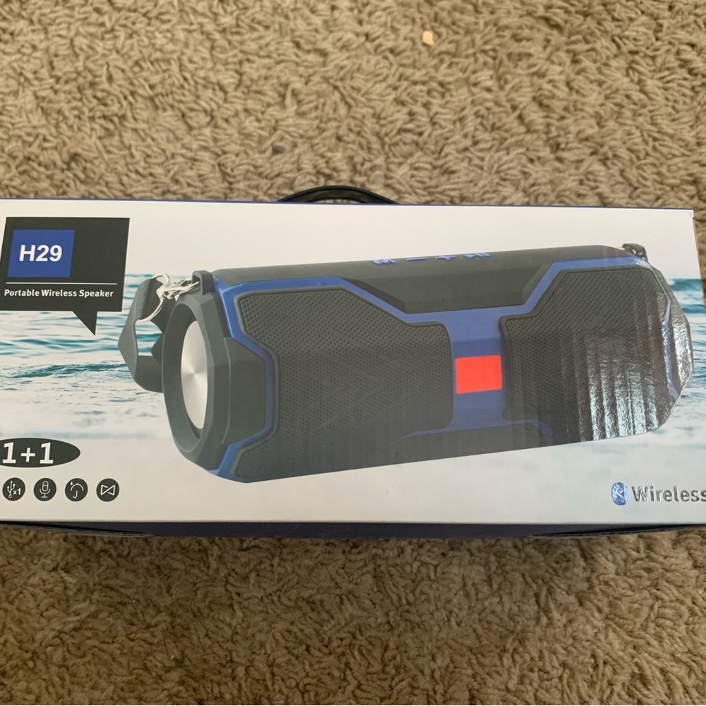 NIB Bluetooth indoor/outdoor speaker. Brand is RUWQ.